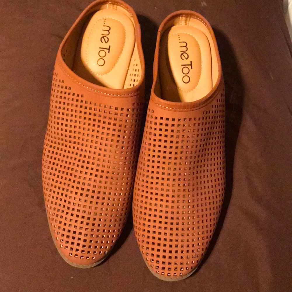 Shoes backless open almost like a clog. Cognac color brand new never worn